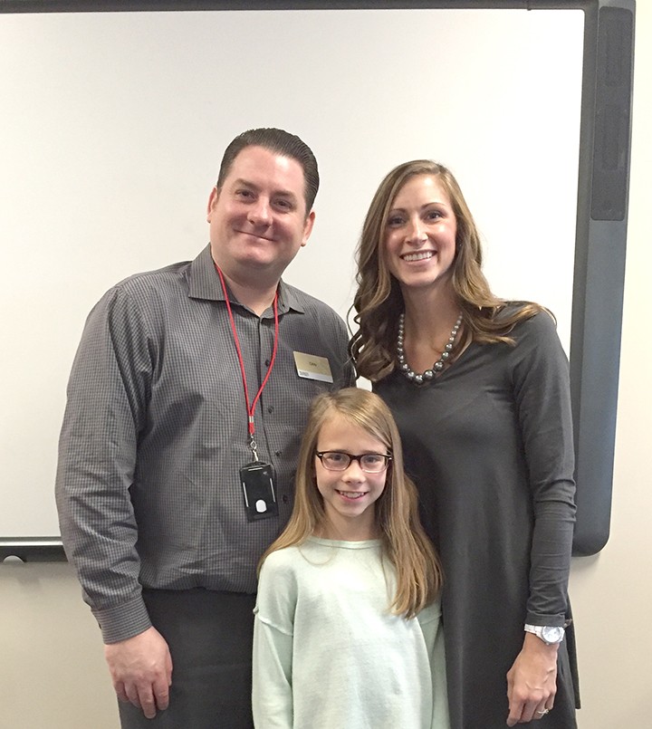 From left, Market District’s Dan Mixan student Cameron Essig and teacher Kelly Franz at the January Teacher of the Month pizza party. (Photo by Anna Skinner)