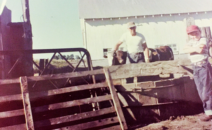 Craig Wood (right) with his father, Bill, on their farm. (Submitted photo)