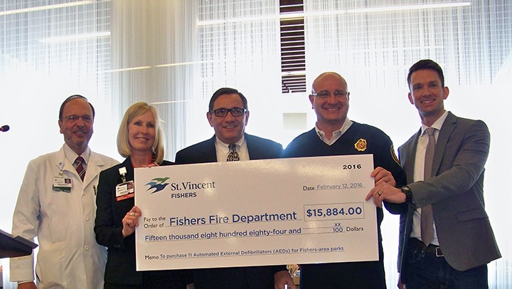 Pictured, from left, are St.Vincent Fishers cardiologist Dr. Chris Hollon, Chief Nurse Officer Kim Nealon, Administrator Gary Fammartino, Fishers Fire Dept. Chief Steve Orusa and Parks & Recreation Director Tony Elliott. (Photo by Sam Elliott)