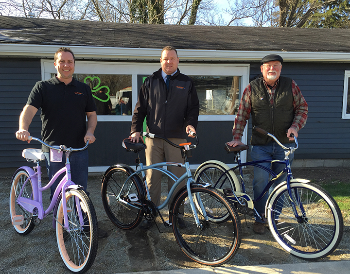 From left, Curt Whitesell, Tim Retzinger  and Bob Beauchamp display the Wander Westfield bikes outside of the Union. (Photo by Anna Skinner) 