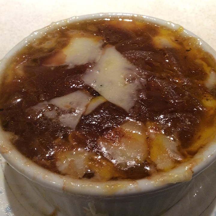 Onion soup should be served with bubbly, broiled cheese on top. (Photo by Ceci Martinez)