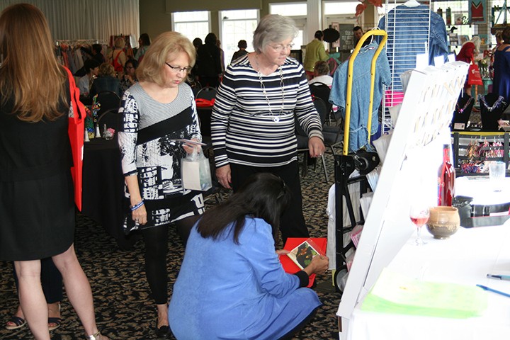 Guests browse work from local independent artists during Art in the Afternoon. (Submitted photo)