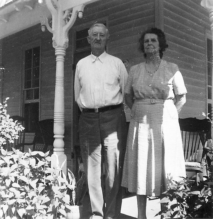 Fred and Rose Graves stand on the front porch of their house in 1957, which is now the site of Bub’s Burgers and Ice Cream on Main Street. (Submitted photo)