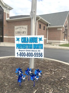 A pinwheel garden at the Sheridan library reminds community members to advocate for children. (Submitted photo)