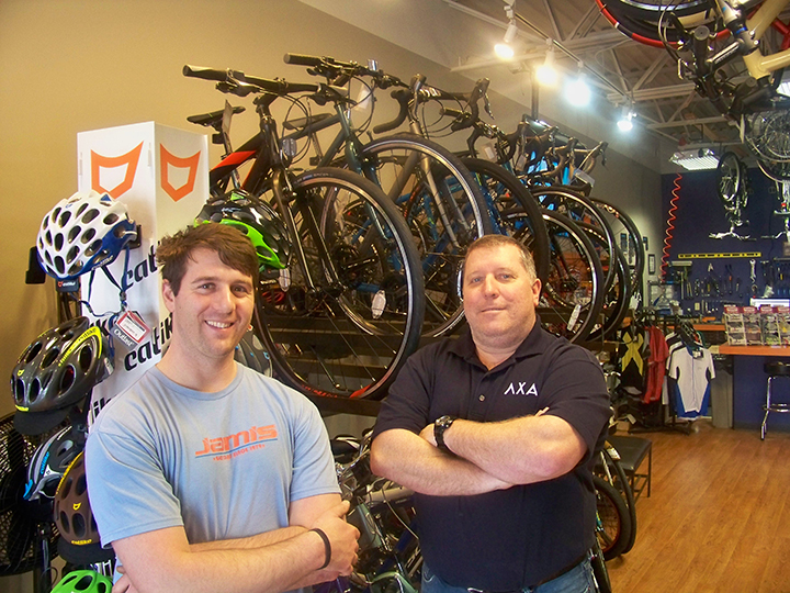 LoKe Bicycles owner Jim Moffitt, right, and employee Kyle Robinson at their Fishers bike shop. (Photo by Sam Elliott)