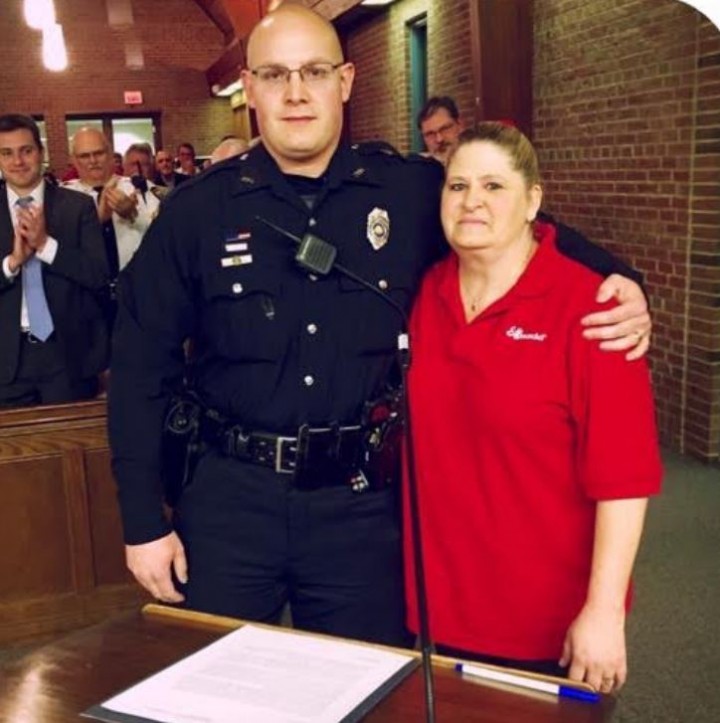 Pam Kelshaw of MADD presents honors ZPD Officer Cody Martin for keeping impaired drivers off the street. (Submitted photo)  