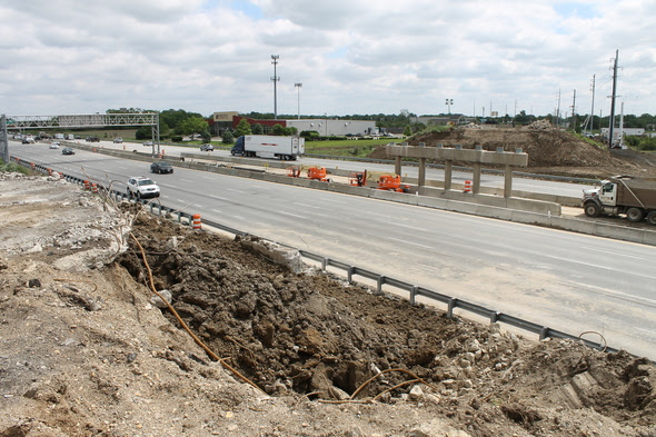 The 106th Street bridge over I-69 has been demolished as crews have begun construction of two new bridges for an oval-shaped roundabout and interchange at 106th and I-69. (Submitted photo)
