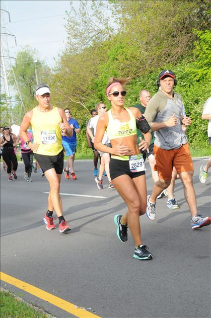 Elizabeth Bradshaw, diagnosed with MS in May of 2015, runs in the 2016 500 Festival Mini Marathon. (Submitted photo)