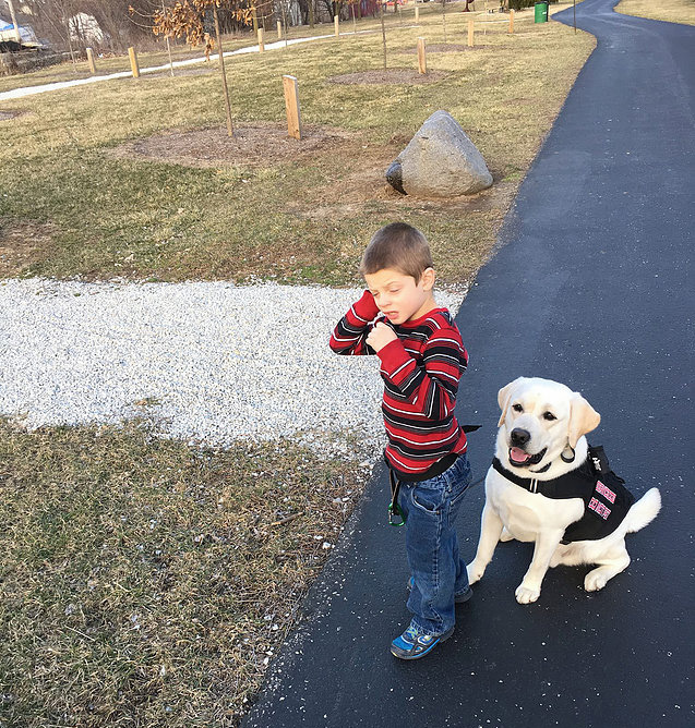 Last year, Friends Helping Friends, inc. raised enough money to allow TJ Durbin to get a service dog, Sunny. (Submitted photo)