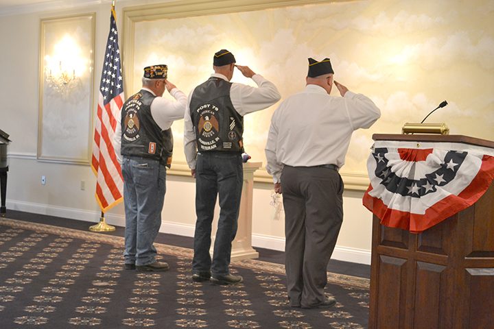 Zionsville American Legion Post 79 members perform flag folding as “Taps” is played during the 2015 program. (Submitted photo)