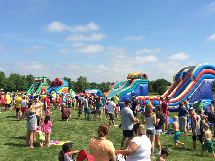 Seven giant inflatable water slides will be set up at Roy G. Holland Memorial Park for this year’s Monsoon Madness event June 18. (Submitted photos)