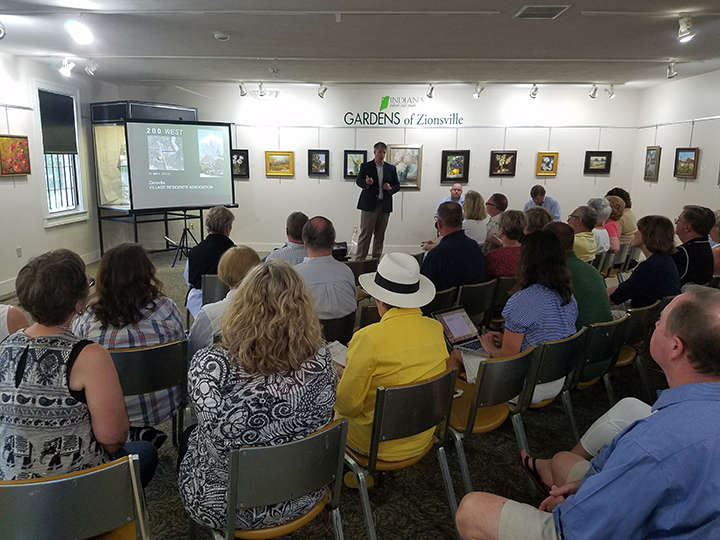 Attorney Tim Ochs presents information on the 200 West project at a meeting with the Village Residents’ Association on May 31. (Photo by Ann Marie Shambaugh)