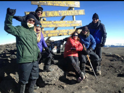 From left, Chris Wallace of Indianapolis, Olivia Anderson of Atlanta, Ga., Angela Griffith of Atlanta, Andrea Ryan of Carmel, Bill Ryan of Carmel and Brian Debshaw of Zionsville at the summit of Mount Kilimanjaro, 12 degrees outside (Submitted photo)