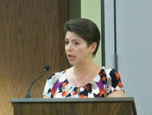 HSE Schools Business Manager Cecilie Nunn addresses the school board on the topic of school fees for the upcoming 2016-17 school year. (Photo by Sam Elliott)