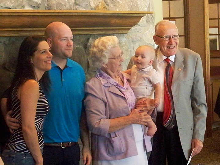 Fishers residents Wayne, right, and Joan Caldwell, center, celebrated their 70th wedding anniversary with a family reunion that included the dedication of their seventh great-grandchild, Isaac Rickey, the son of their grandson Jeffrey and Amber Rickey. (Photos by Sam Elliott)