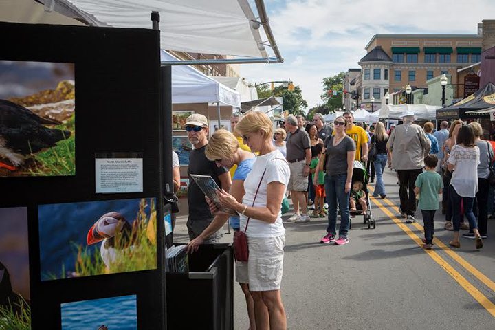 Patrons browse art during the 2015 Carmel International Arts Festival. (File photo)