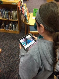 A student at Cherry Tree Elementary works on a project using an iPad in the Media Center. (Submitted photo)