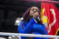 Jamera Robinson sings the national anthem in July at the Indiana Black Expo before the amateur boxing showcase. (Photo by Jason Conerly)