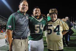 Coach Jake Gilbert, David Mendoza and Karen Olinger celebrate after a victory. (Photos by Anna Skinner)