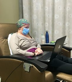 Cari Hahn works while receiving chemotherapy treatments. (Submitted photo)