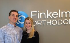 Brett Finkelmeier and his wife Nicole in his new Carmel orthodontics practice. (Photo by Mark Ambrogi)