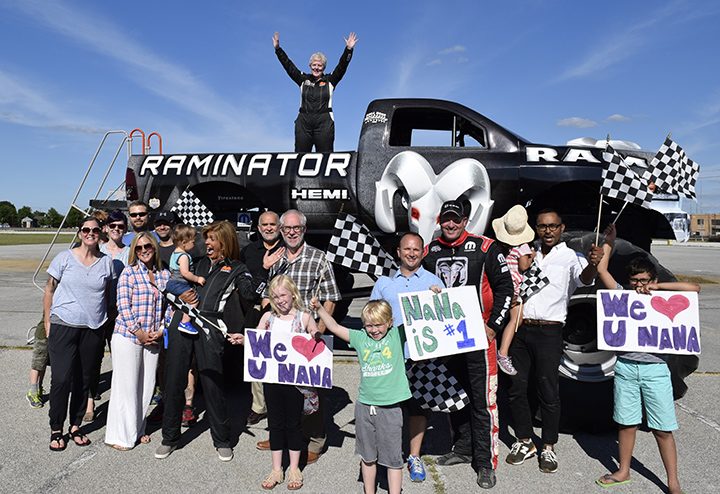 Sheryl Beerbouer stands on the Raminator, a monster truck driven by Mark Hall, as her family, Hoda and Hall stand before it. (Submitted photo courtesy of NBC/The Today Show)