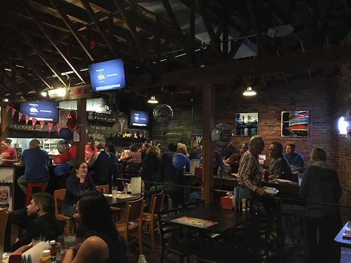 Chicago Cubs fans enjoy watching Game 2 of the World Series at Rush on Main. The Cubs beat the Cleveland Indians 5-1. (Photo by Nick Poust)  