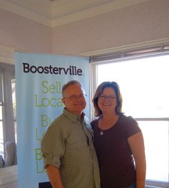 Tom and Pam Cooper, founders of Boosterville. (Photo by Heather Lusk)