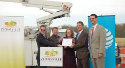 From left, Boone County EDC Business Development Manager Ben Worrell, Zionsville Planning and Economic Development Director Wayne DeLong, State Rep. Donna Schaibley, Mayor Tim Haak and AT&T Indiana President Bill Soards celebrate Creekside Corporate Park becoming Fiber Ready. (Photo by Heather Lusk)