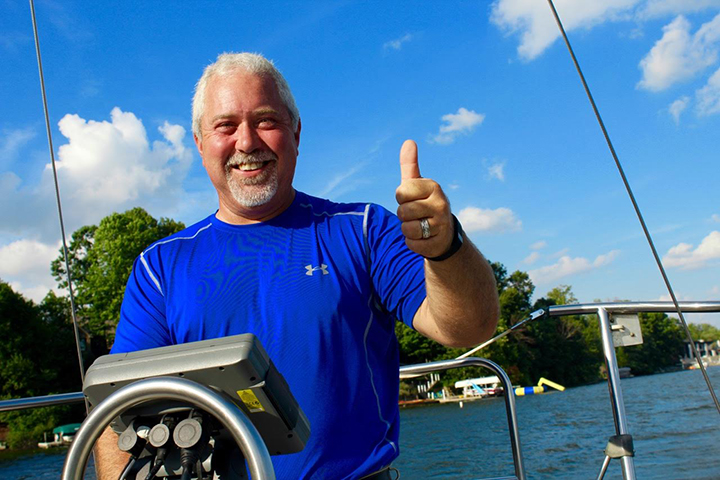 Todd Bracken, owner of Dauntless Sailing School at Geist, is gearing up for prime sailing season and teaching locals how to sail. (Photo by Amy Pauszek)