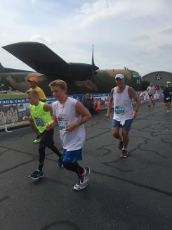 Jim Lathrop runs the Air Force Half Marathon with his grandsons Michael and Conner Brunt. (Submitted photo)