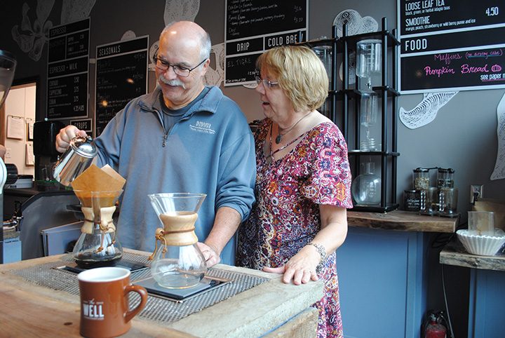 Tony Zancanaro pours coffee while his wife, Debbie, observes. (Photo by Anna Skinner)