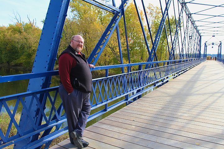 Al Patterson pauses on Washington County Bridge No. 113. (Photo by Sadie Hunter)