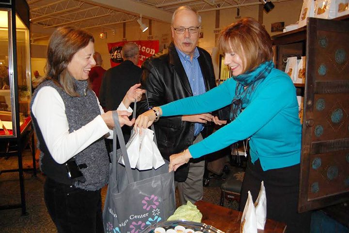 Artisan Carol Marquis with attendees at last year’s Artisans’ Fare. (Submitted photo)