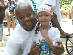 Gary Brackett pauses with a young fan. (Submitted photos)