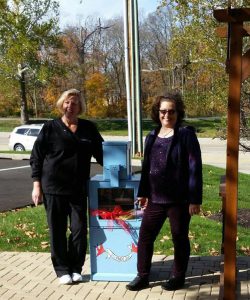 My Dental Care in Fishers opened a Free Little Library Nov. 10. Dr. Cynthia Becker, left, and hygienist LouAnn Dale. (Submitted photo)