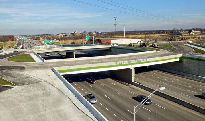 The new I-69, 106th Street interchange is a two, two-lane bridge in an oval roundabout fashion.  