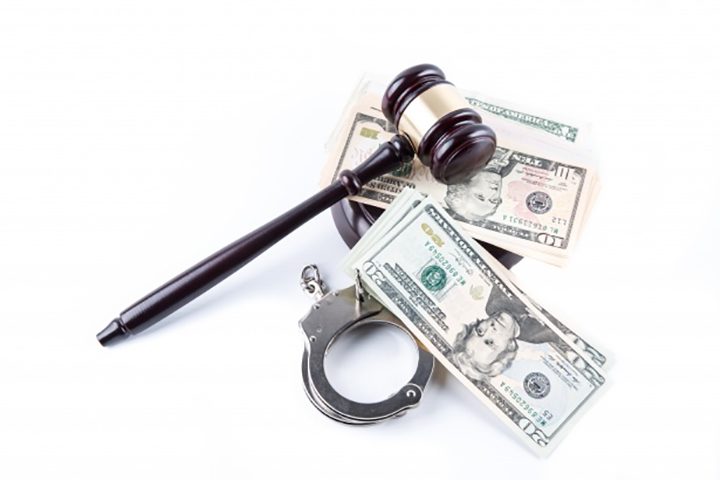 judge gavel handcuffs and money 14612892856rS