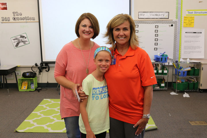 From left, Vicki Burdick of Edge Guys, Ellie Smith and Tracie Greene at the Teacher of the Month Party. (Photo by Ann Marie Shambaugh)