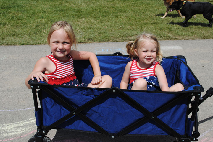 Noelle and Lilli Pahnke wear patriotic clothing during the event. (Photo by Anna Skinner)