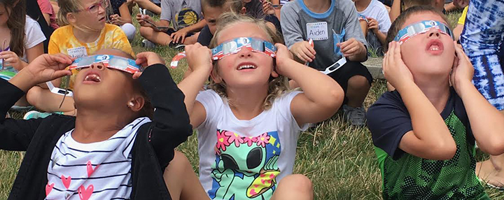 Snapshot: Local students view eclipse during school