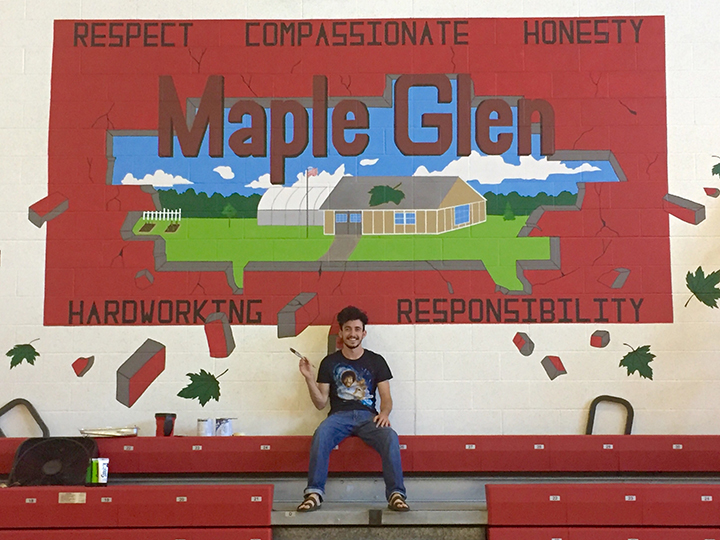 Snapshot: Flannagan paints mural for Maple Glen Elementary School