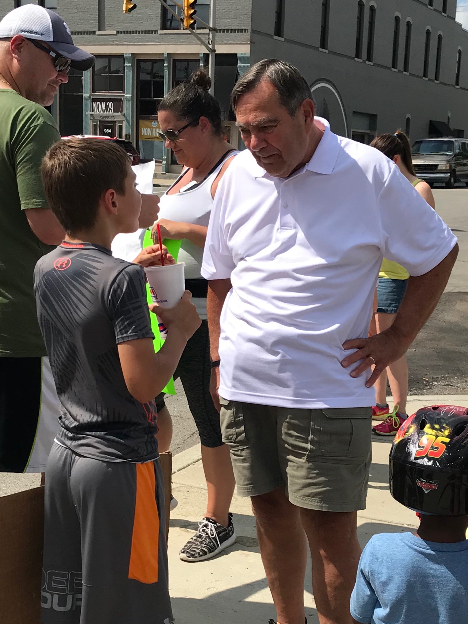 Noblesville Mayor John Ditslear speaks with Ray Kenley, the Noblesville East Middle School student credited for starting the protest.