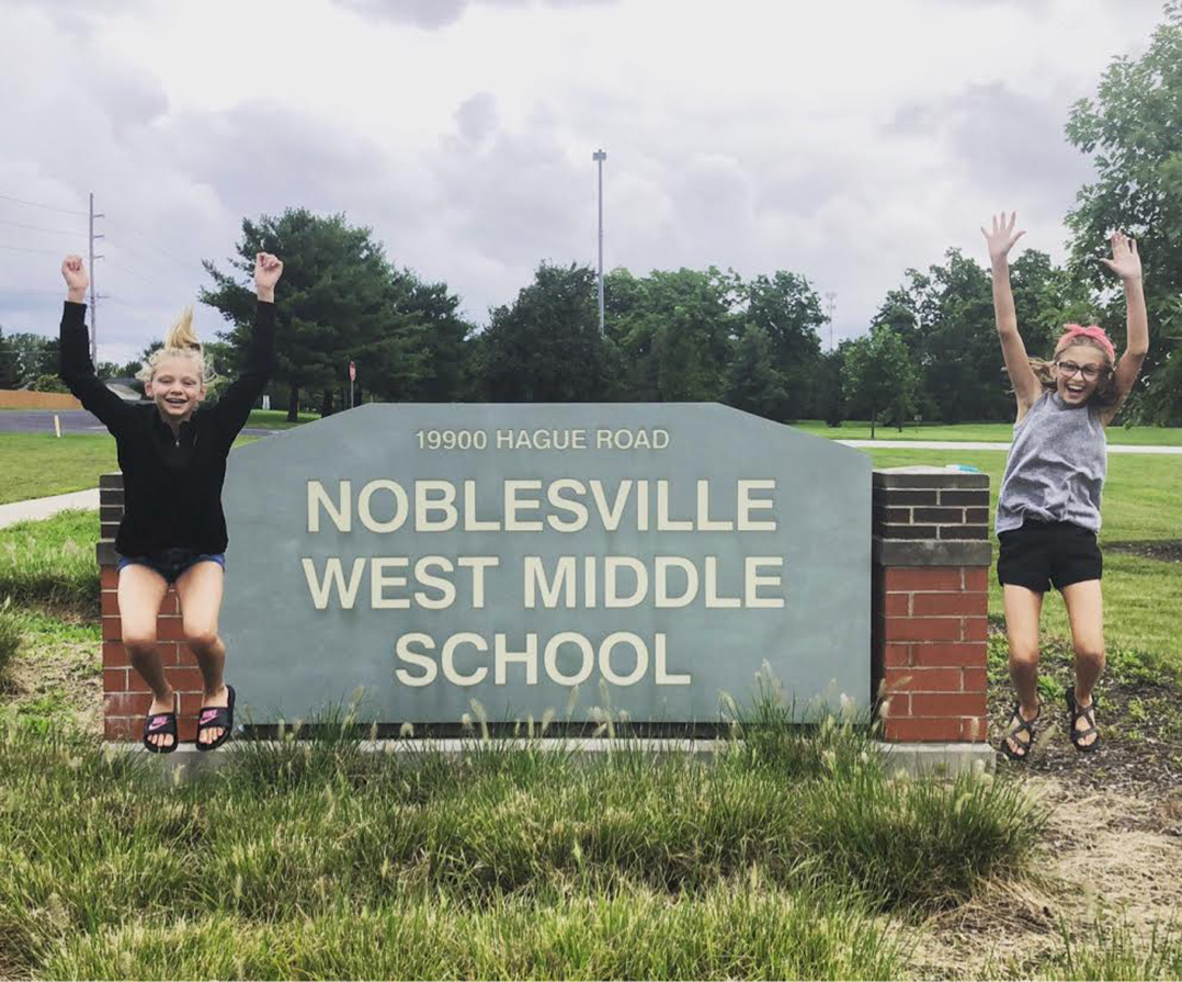 Sixth graders Olivia and Chloe celebrate the start of middle school. (Photo by Barb Olszewski)