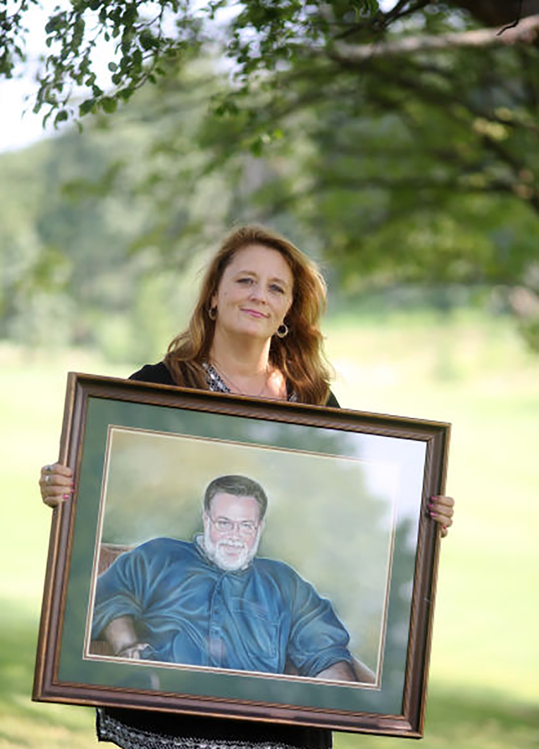 Anne with Portrait of Husband Chris