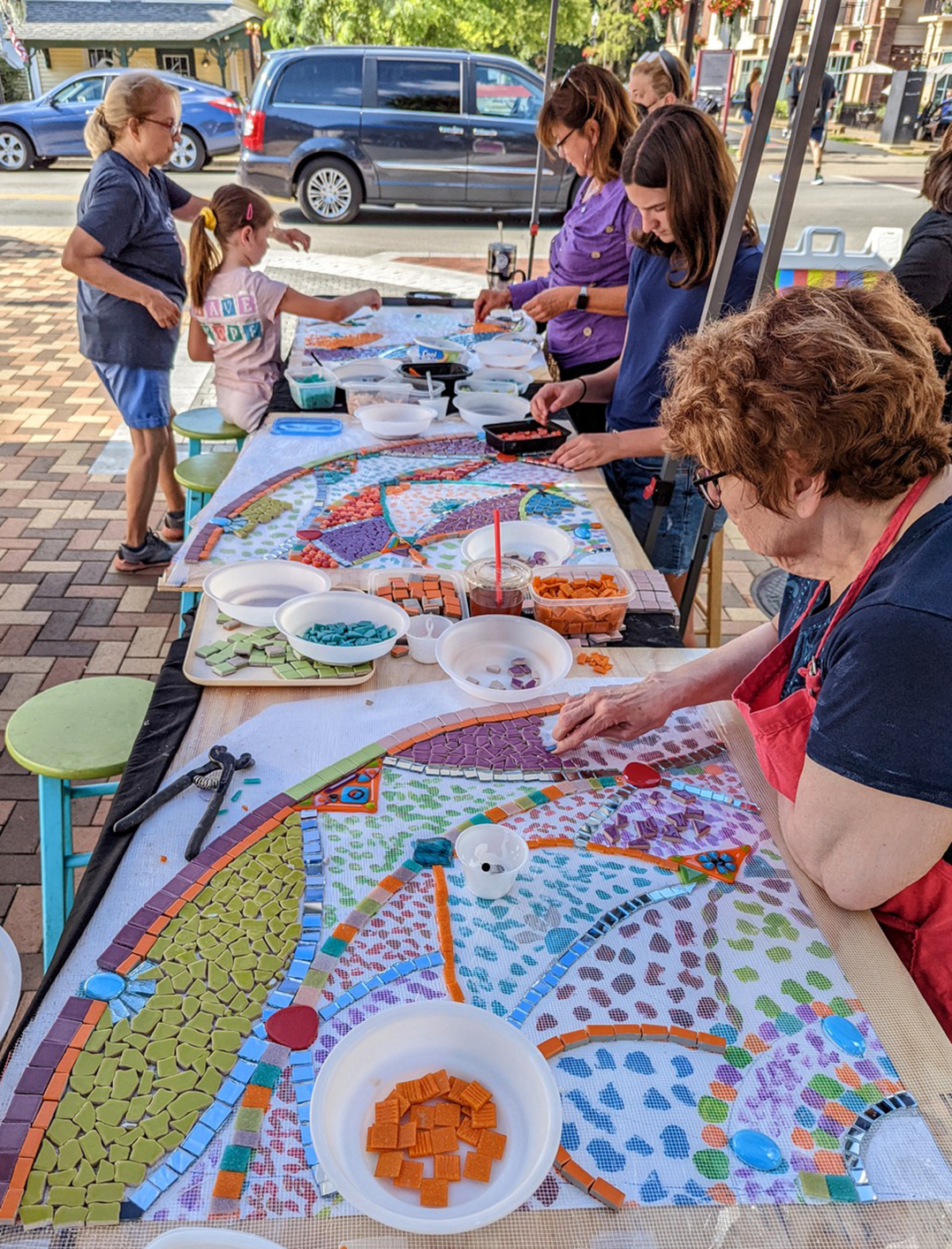 Community chips in to create murals in Carmel