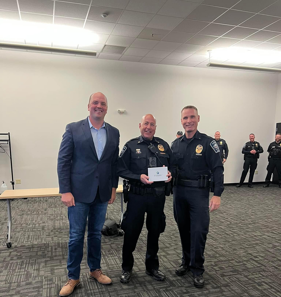Fishers police officer honored for 20 years of service