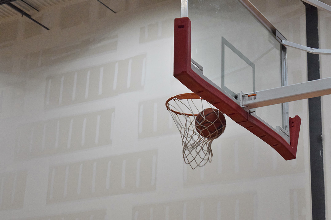 SLED basketball in hoop