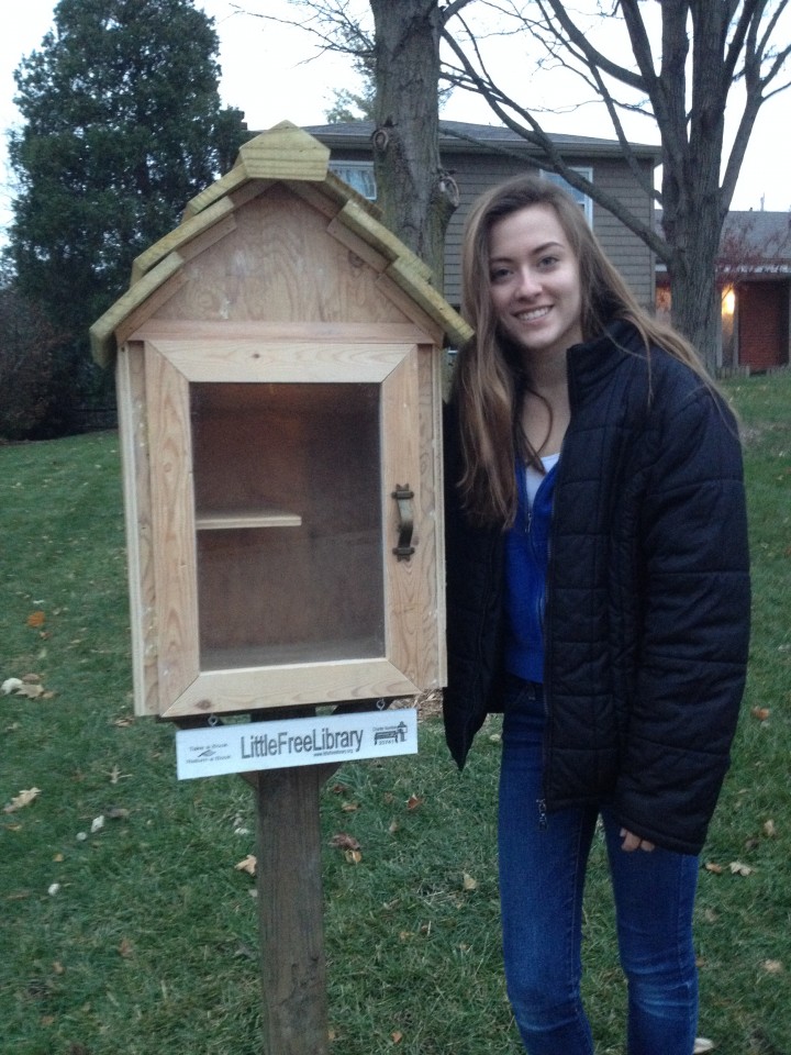 Beth Hannah and her completed library. (Submitted photo)