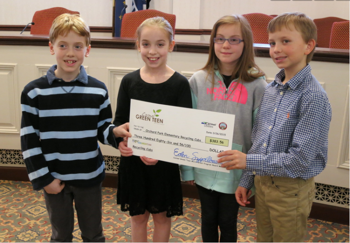 Orchard Park students proudly hold check. (Submitted photo)